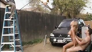 Behind the scenes footage of porn movie action